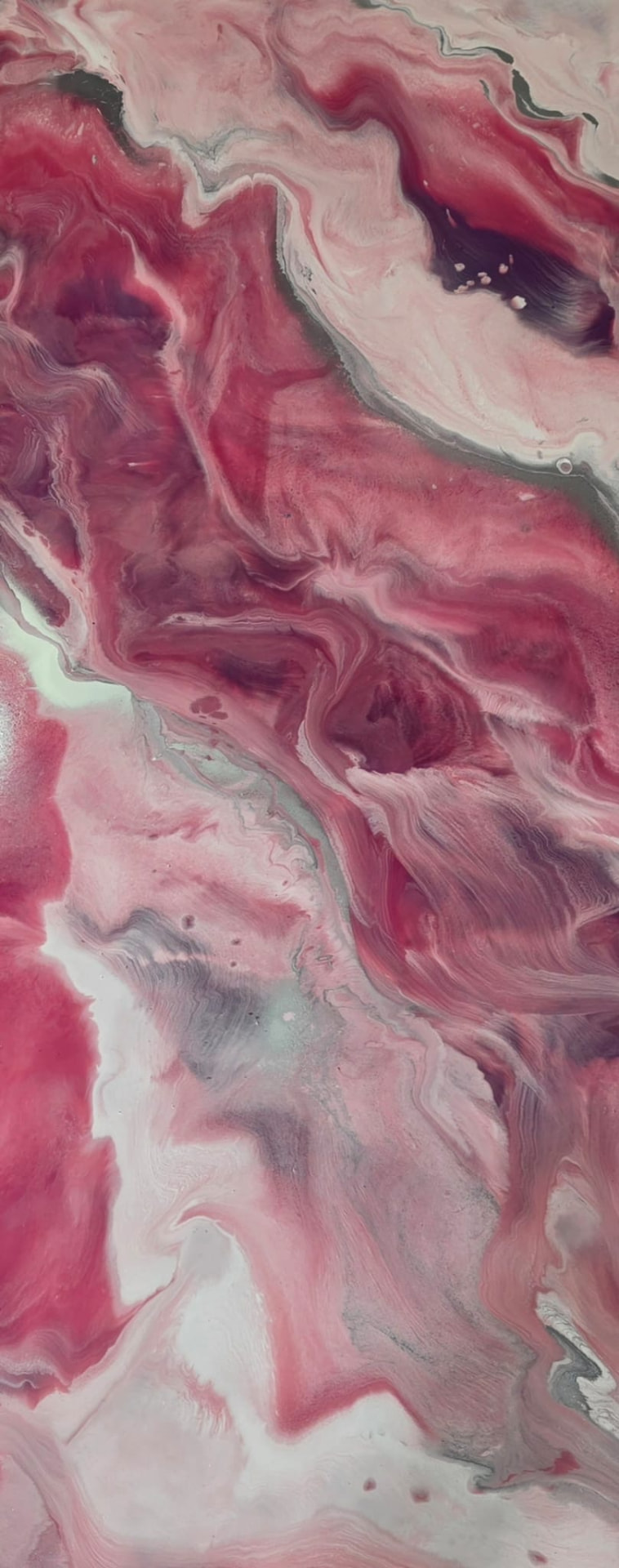 Metallic epoxy floor in deep rose, blush and white marble tones